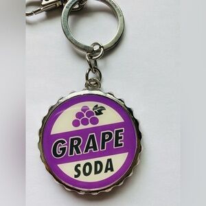 NWOT Pixars Up Grape bottle soda cap Bottle opener Key chain Purle